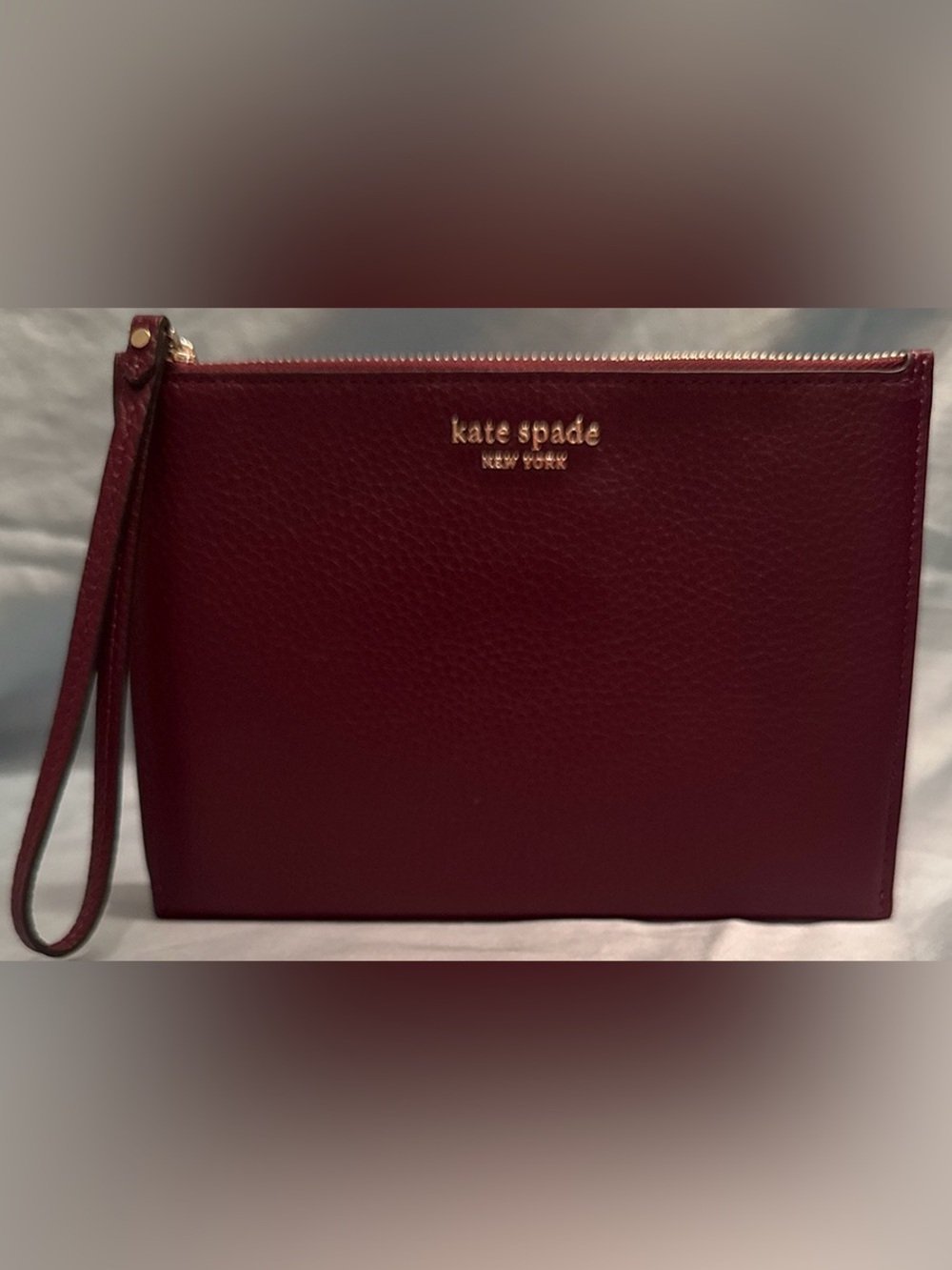 kate spade Burgundy Pebbled Leather Wristlet